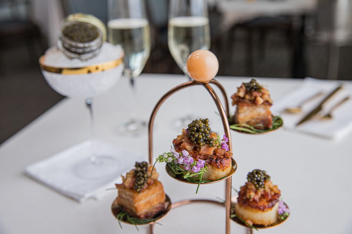The Surf and Turf dish will be served at the Lounge at The Marine Room in La Jolla.