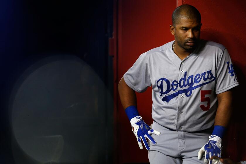Dodgers third baseman Alberto Callaspo was designated for assignment after the team's acquisition of second baseman Chase Utley.