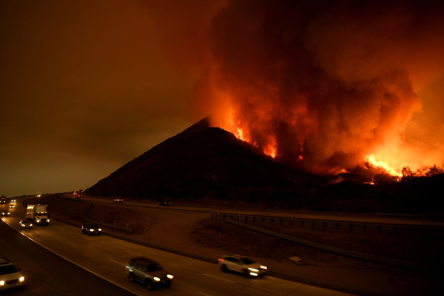 The Thomas fire burns along the 101 Freeway north of Ventura on Wednesday evening.