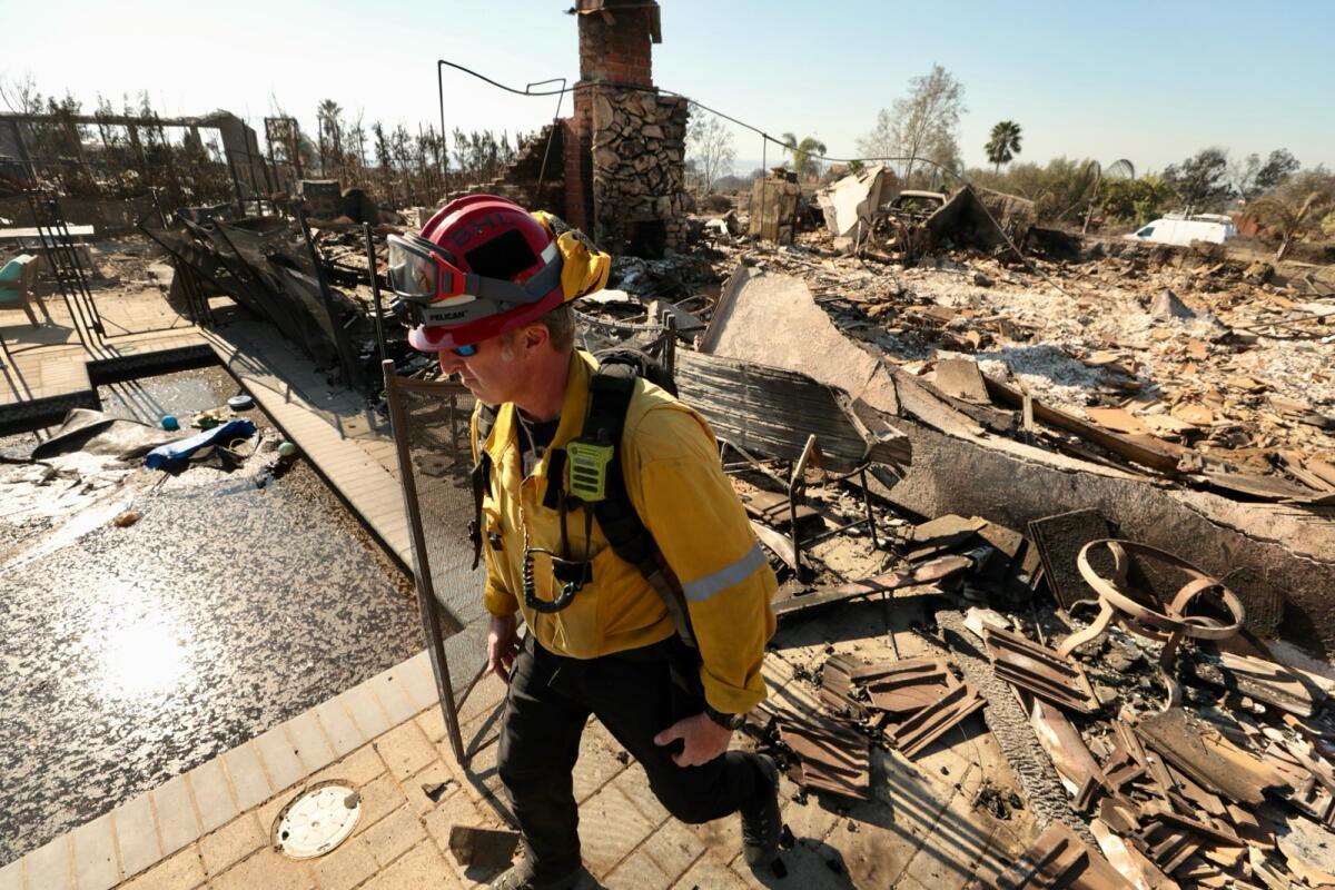 Kevin Rundle Fire Favorable weather assists firefighters in battling the devastating ...