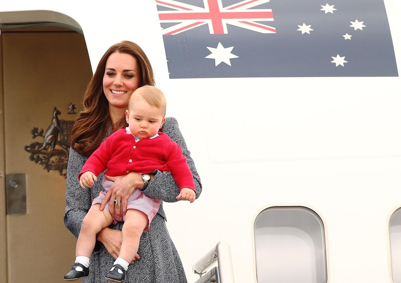 Catherine, duchess of Cambridge, and her son Prince George, leave the Defence Establishment Fairbairn as they head back to the U.K. after finishing their royal visit to Australia.