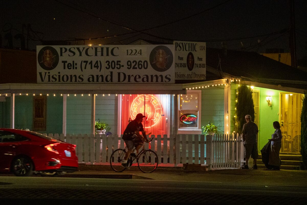 A psychic advertises  along Beach Boulevard in Anaheim 
