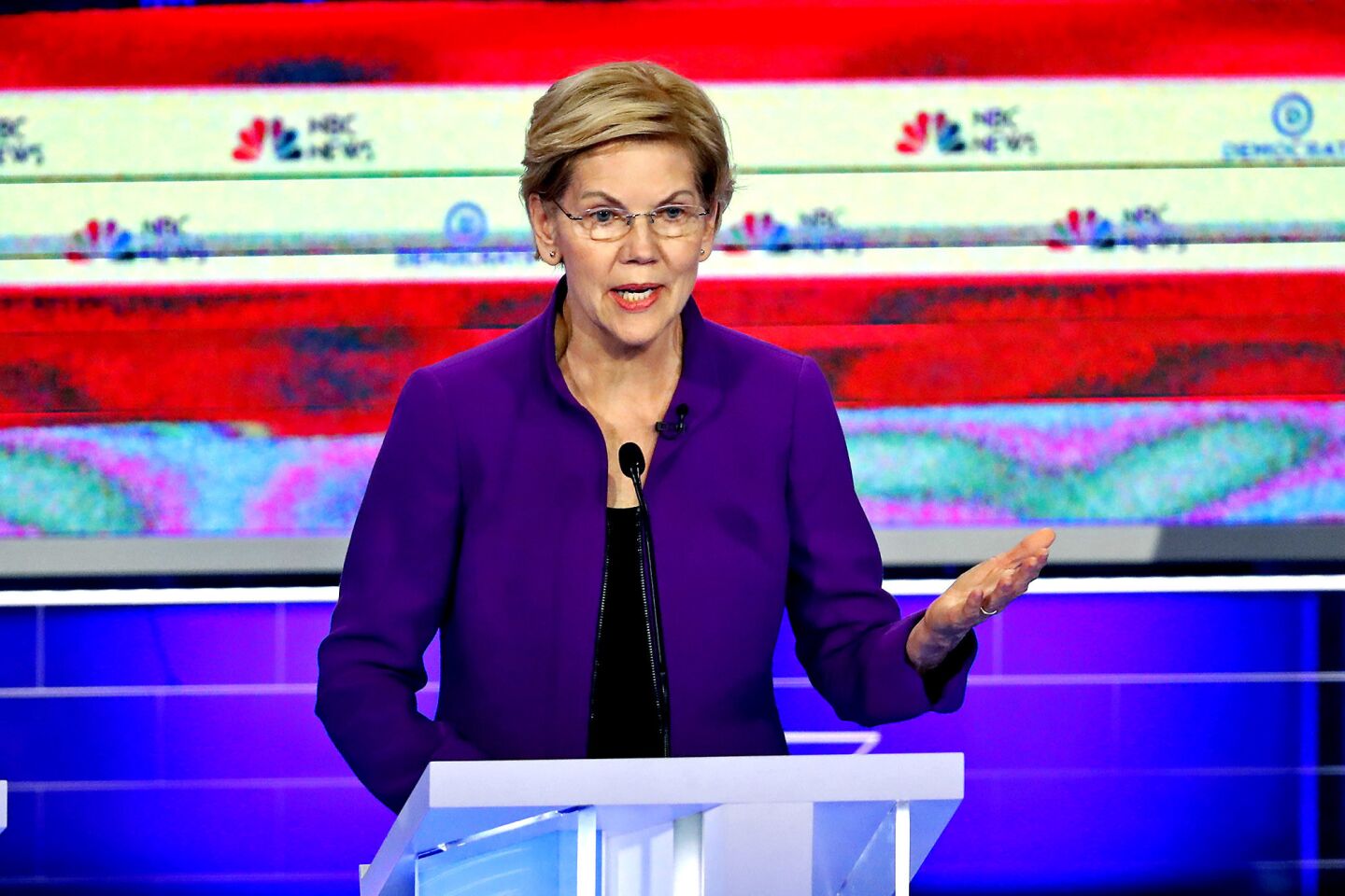 Sen. Elizabeth Warren (D-Mass.) set the tone in the early part of the debate. She spoke of specific policy proposals, such as breaking up big tech corporations and raising taxes on the wealthy.