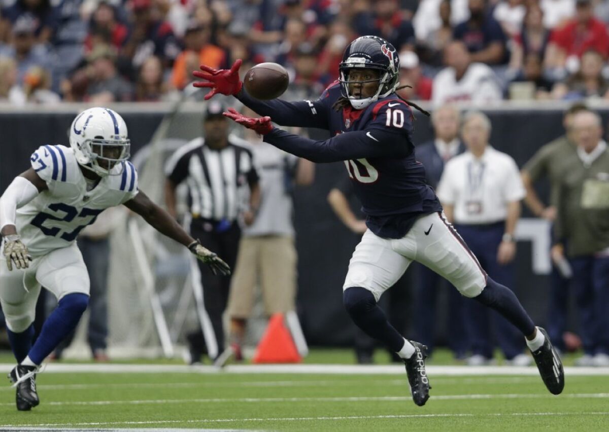 Texans receiver DeAndre Hopkins stretches out to make a catch during a game against the Colts on Nov. 5 at NRG Stadium.