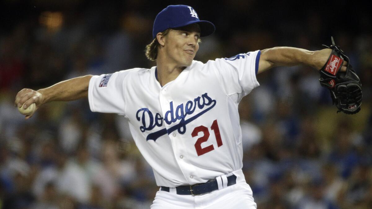 Dodgers starter Zack Greinke delivers a pitch during Game 2 of the National League division series against the St. Louis Cardinals on Oct. 4.