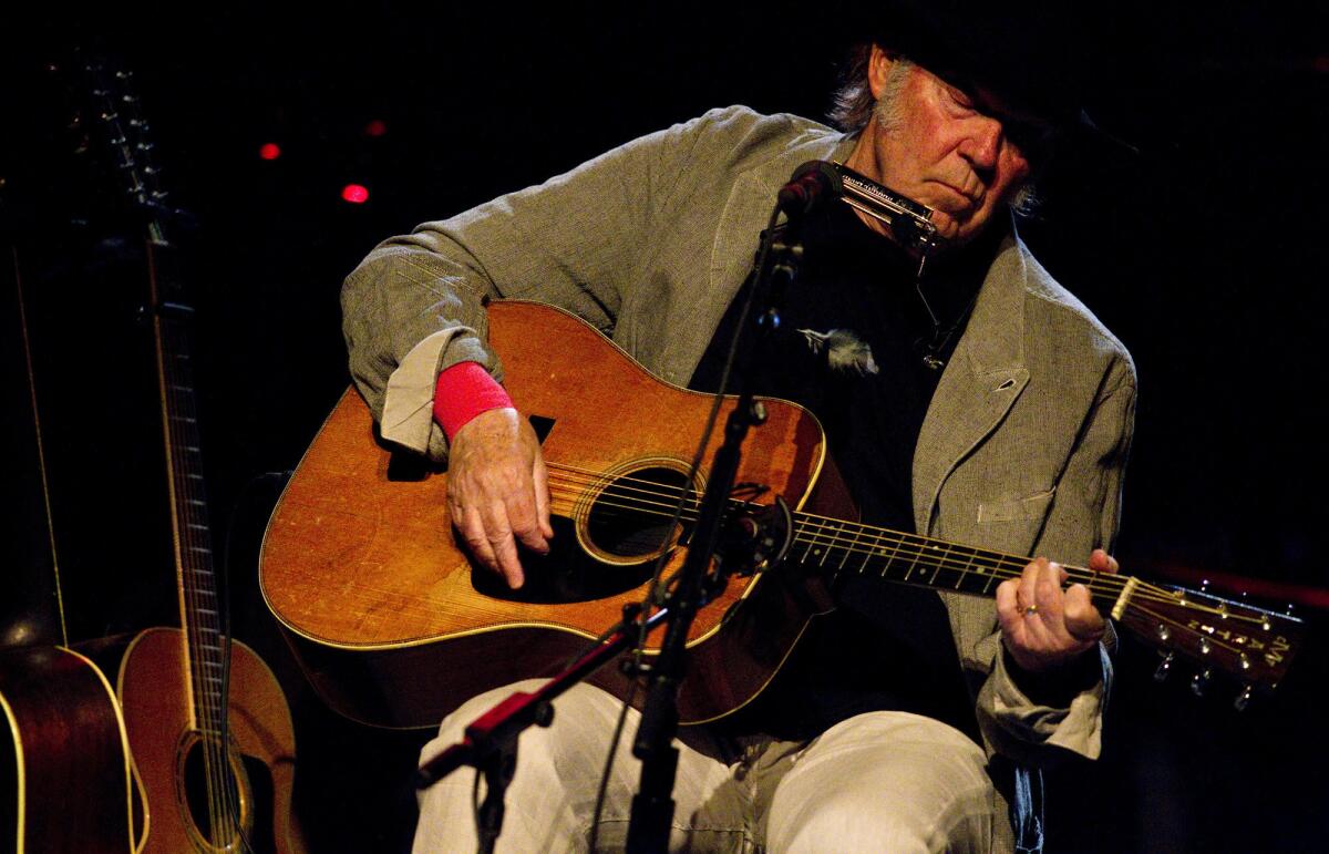 Neil Young performs at the Dolby Theatre in Hollywood.