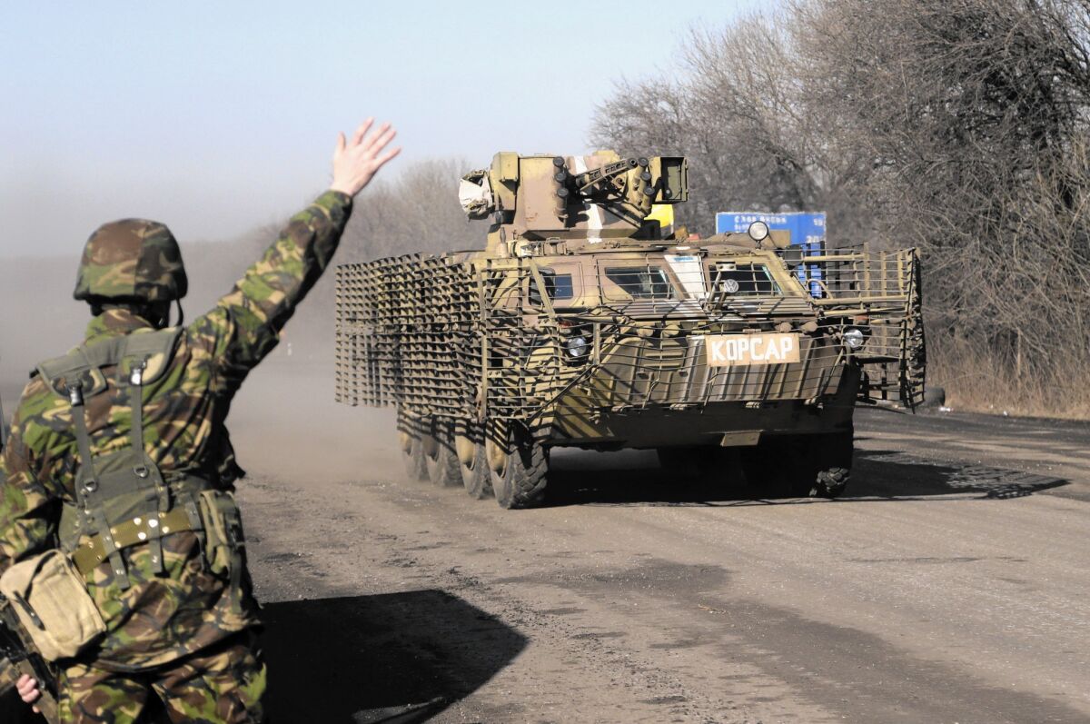 Ukrainian troops move toward Debaltseve in eastern Ukraine on Feb. 13.