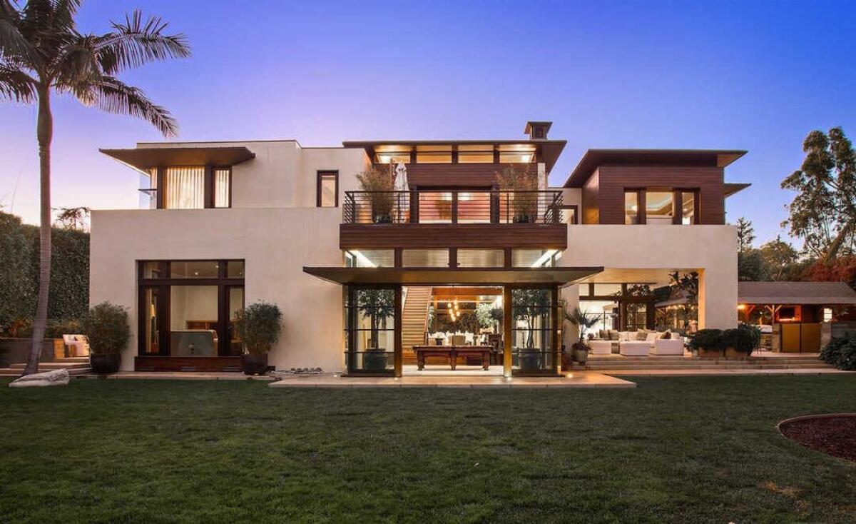 At the heart of the home, theres a voluminous atrium under 35-foot mahogany vaulted ceilings.