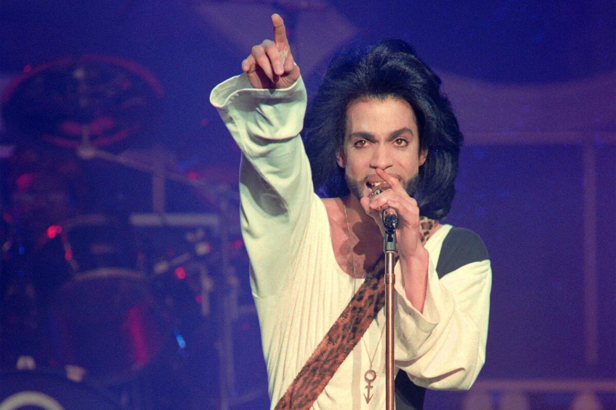 Prince performs at the Parc des Princes stadium in Paris on June 16, 1990. The music pioneer died Thursday in Minnesota.