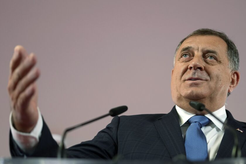 FILE - Bosnian Serb leader Milorad Dodik speaks during a news conference after claiming victory in a general election in the Bosnian town of Banja Luka, 240 kms northwest of Sarajevo, on Oct. 3, 2022. U.S. Secretary of State Antony Blinken has compared the policies of separatist leader of the Serbs in Bosnia to those of Russian President Vladimir Putin following his moves to curb dissent and LGBTQ rights. Blinken said on Twitter late on Wednesday that "Milorad Dodik's attacks on basic rights and freedoms in Republika Srpska show he is on President Putin's authoritarian path." (AP Photo/Darko Vojinovic, File)