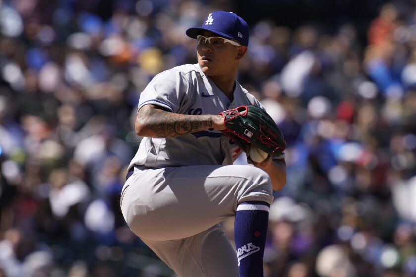 Los Angeles Dodgers starting pitcher Julio Urias (7) in the first inning of a baseball game.