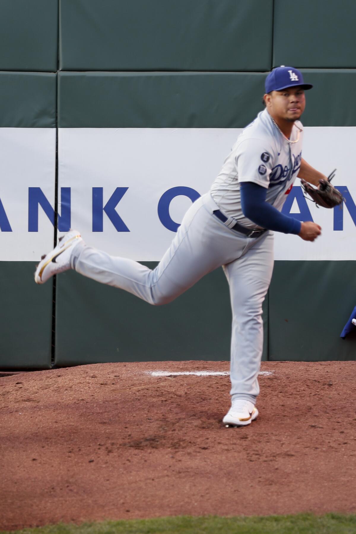 Dodgers relief pitcher Brusdar Graterol warms up in the bullpen during the first inning.