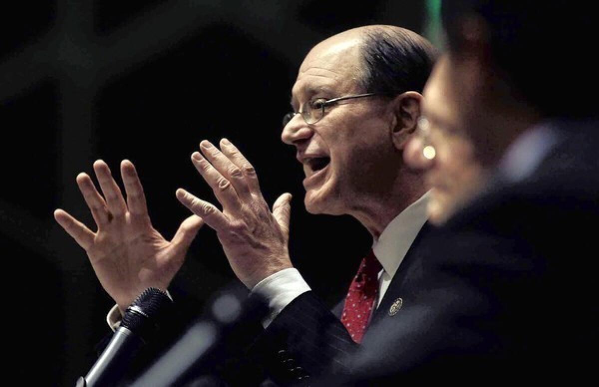 Rep. Brad Sherman makes a point during a debate with Rep. Howard Berman and GOP candidate Mark Reed in Tarzana earlier this year.