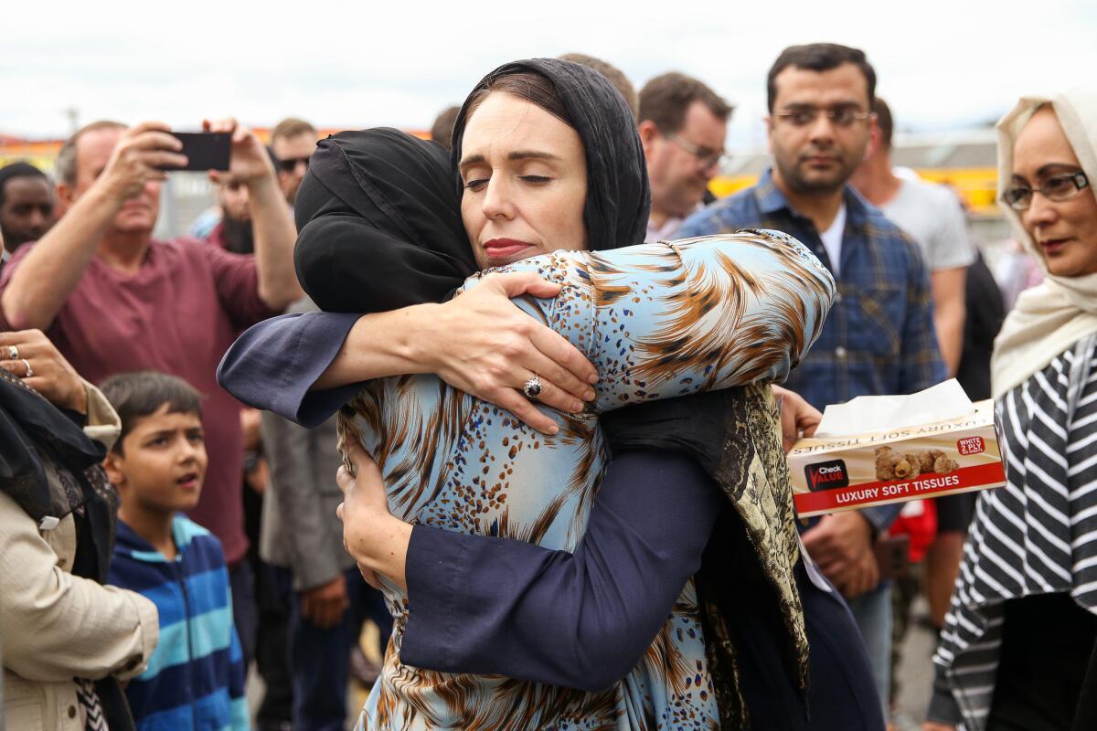 Prime Minister Jacinda Ardern hugs a mosque-goer at the Kilbirnie mosque in Wellington on March 17.
