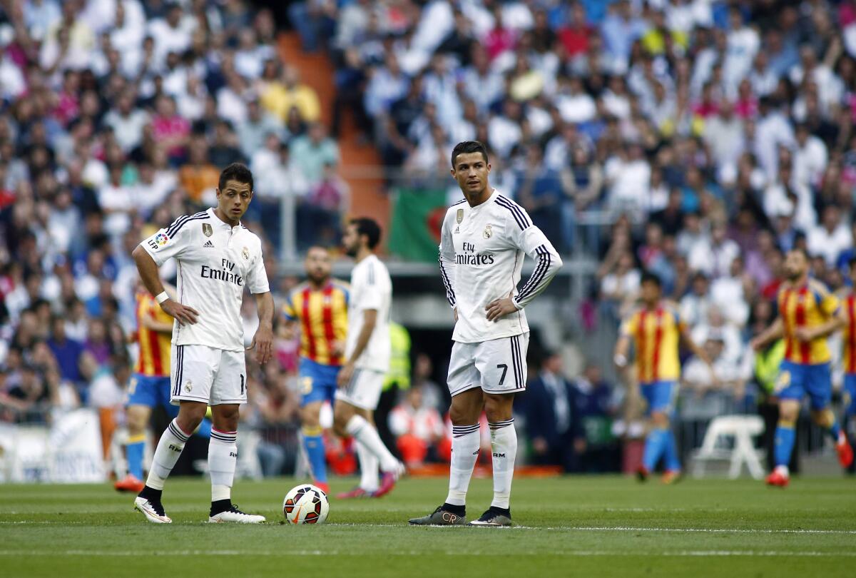 Real Madrid's Cristiano Ronaldo, right, and Chich 