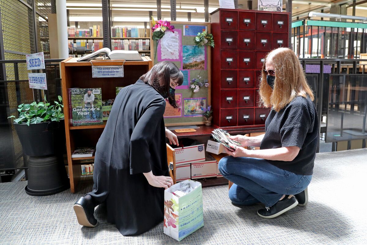 Nurtured by pandemic habits, Huntington Beach Central's 'seed library