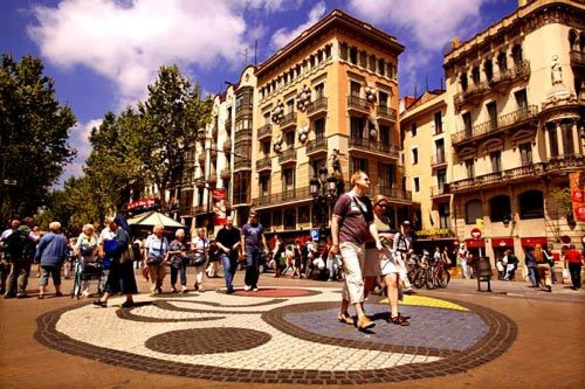 Barcelona's La Rambla street, a social scene, informal stage and site of unusual stores.