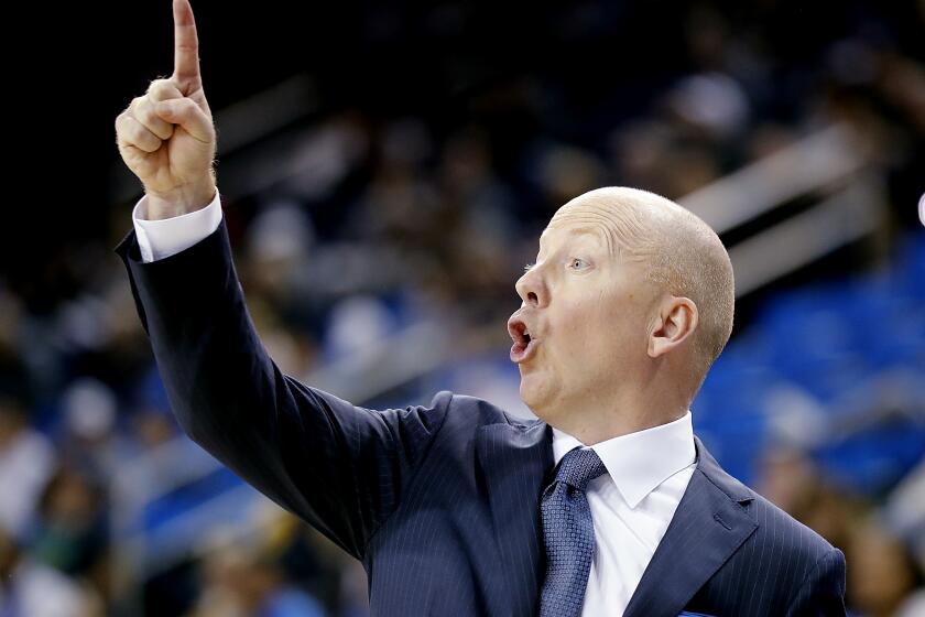 UCLA coach Mick Cronin yells instructions to his team during a game against Hofstra on Nov. 21 at Pauley Pavilion.