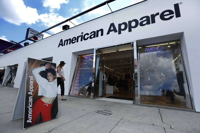 American Apparel received a takeover bid that would return Dov Charney back to the company he founded, a person familiar with the situation said.