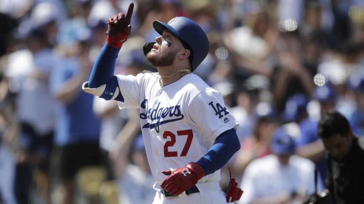 Dodgers rookie Alex Verdugo celebrates his home run during the fifth inning Sunday.