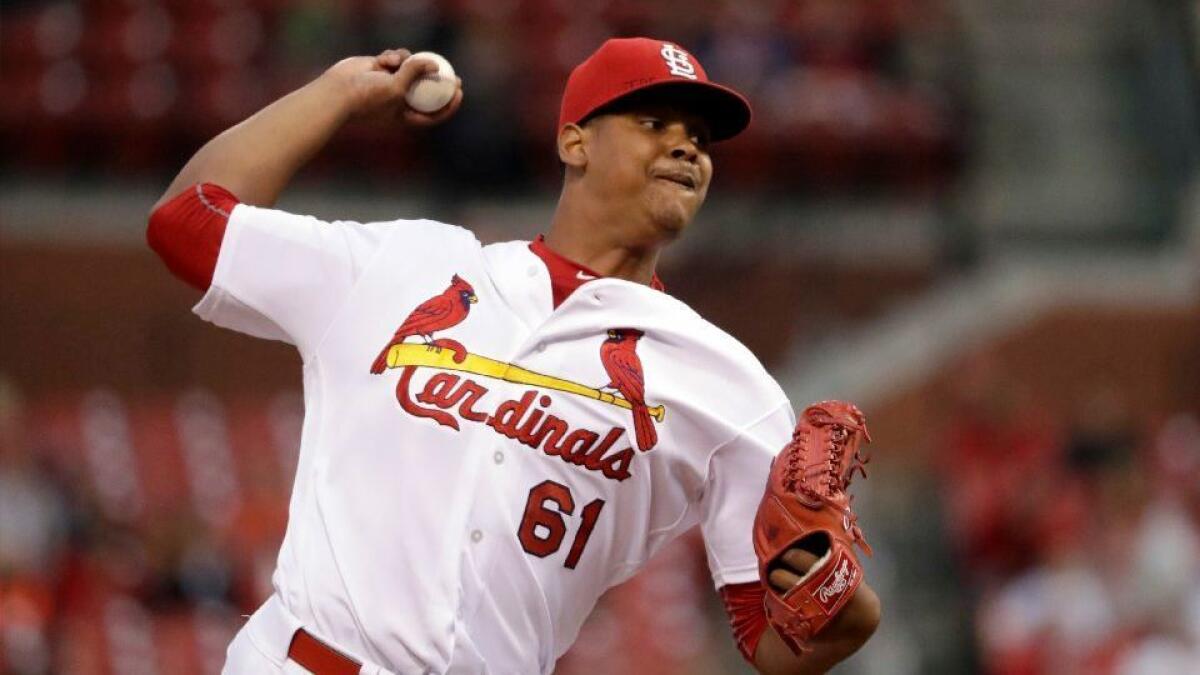 Cardinals starting pitcher Alex Reyes throws a pitch against the Cincinnati Reds on Sept. 29, 2016.