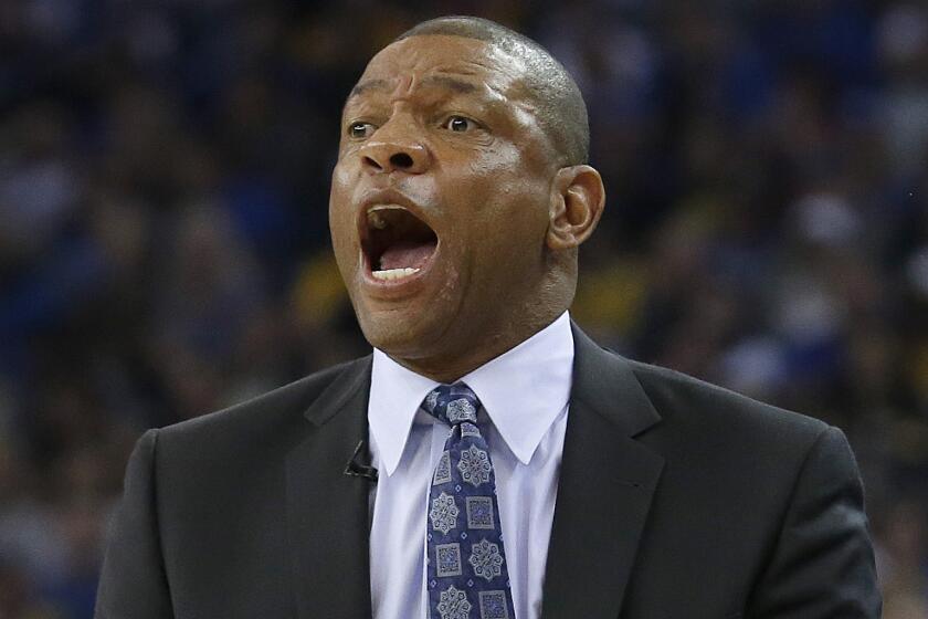Clippers Coach Doc Rivers instructs his players during a 106-98 loss to the Golden State Warriors on March 8, 2015.