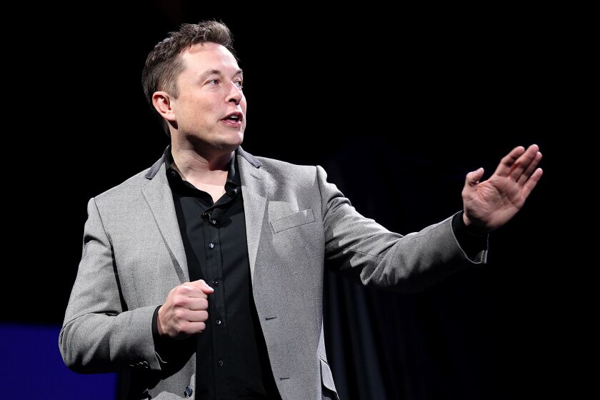 Tesla chief executive Elon Musk, shown in April, visited Stephen Colbert on CBS' "Late Show" on Wednesday.