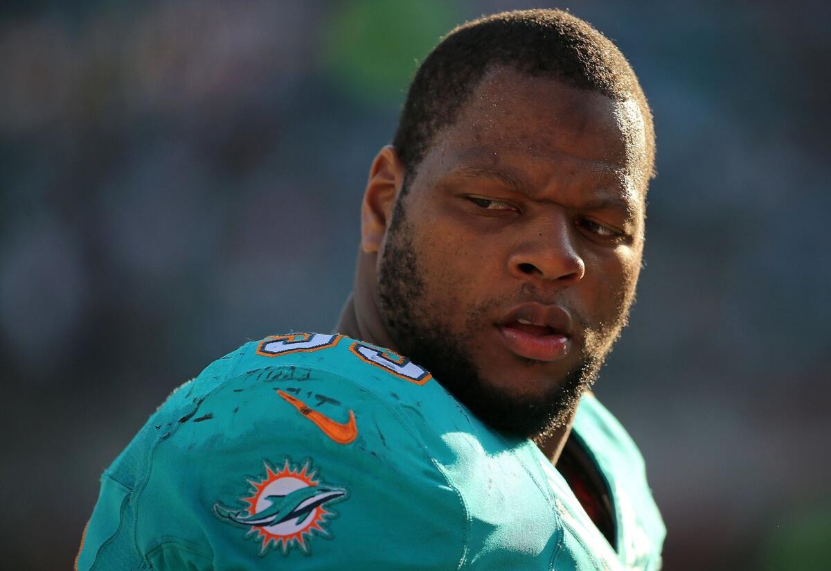 Ndamukong Suh looks on during a Sept. 20 game against the Jacksonville Jaguars in Jacksonville.