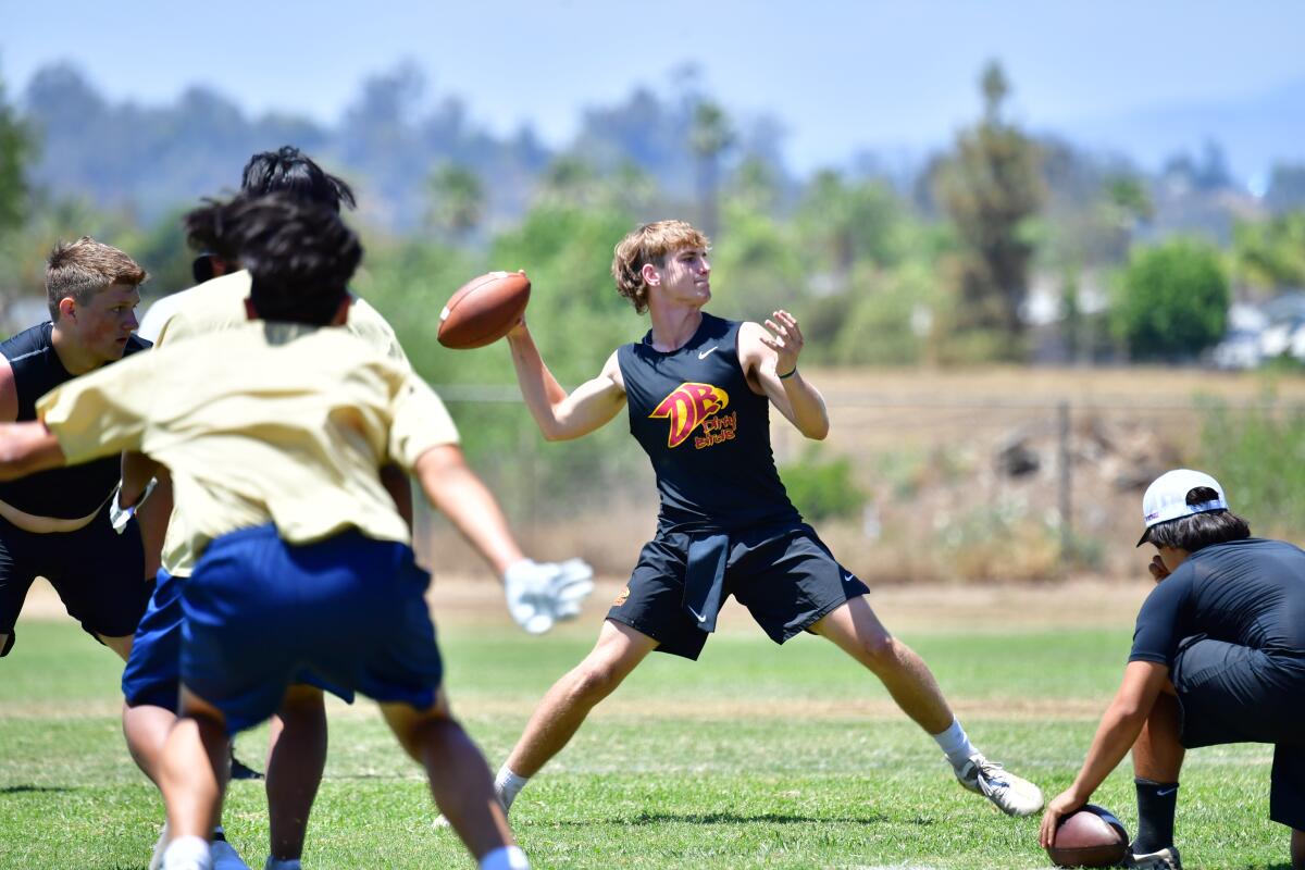 The Torrey Pines 7on7 quarterback prepares to launch a pass.