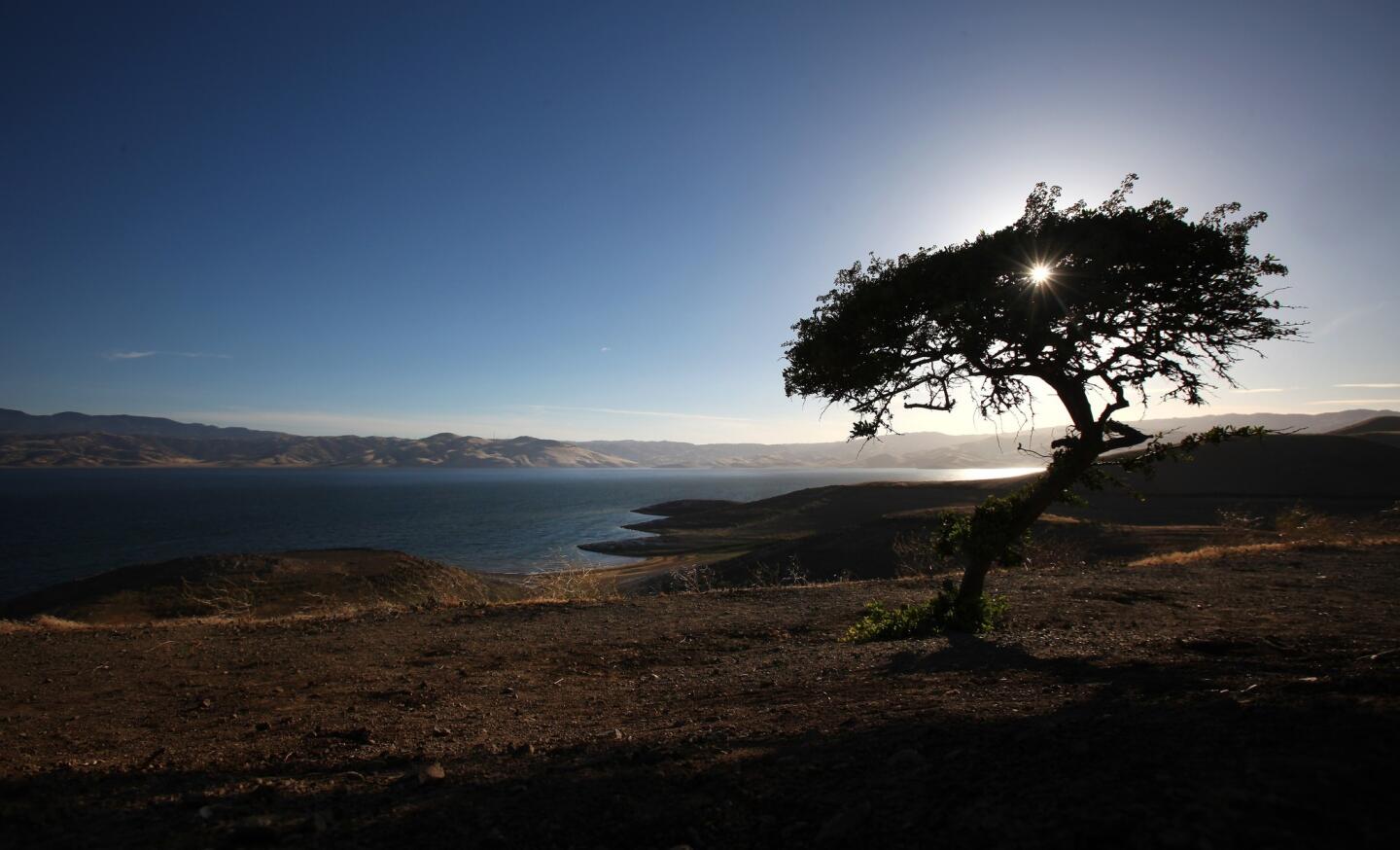 Waters along the receding shoreline of the San Luis Reservoir near Los Banos, Calif., create a clamshell pattern. The reservoir is part of the Central Valley Project and holds water supplies for the Westlands Water District.