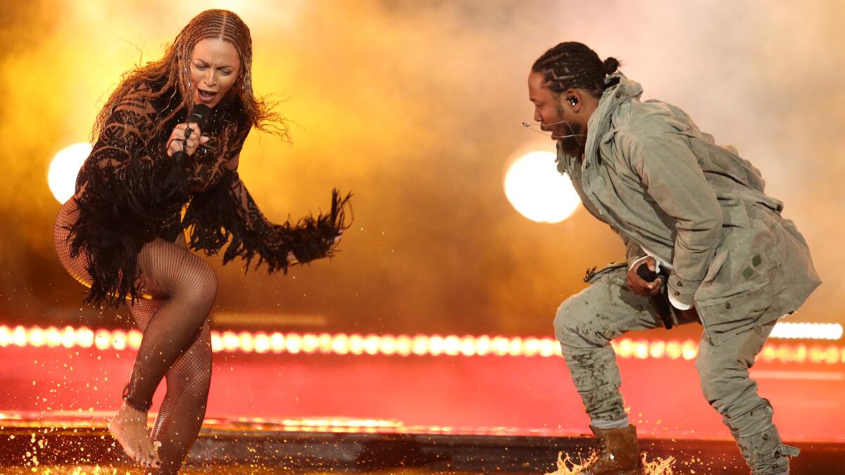 Beyonce and Kendrick Lamar perform on Sunday's show.