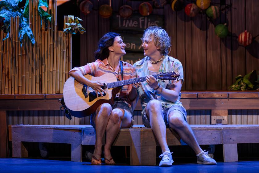 Ashley Moniz as Rachel and Andrew Polec as Tully in Moonlight Stage Productions' "Escape to Margaritaville."