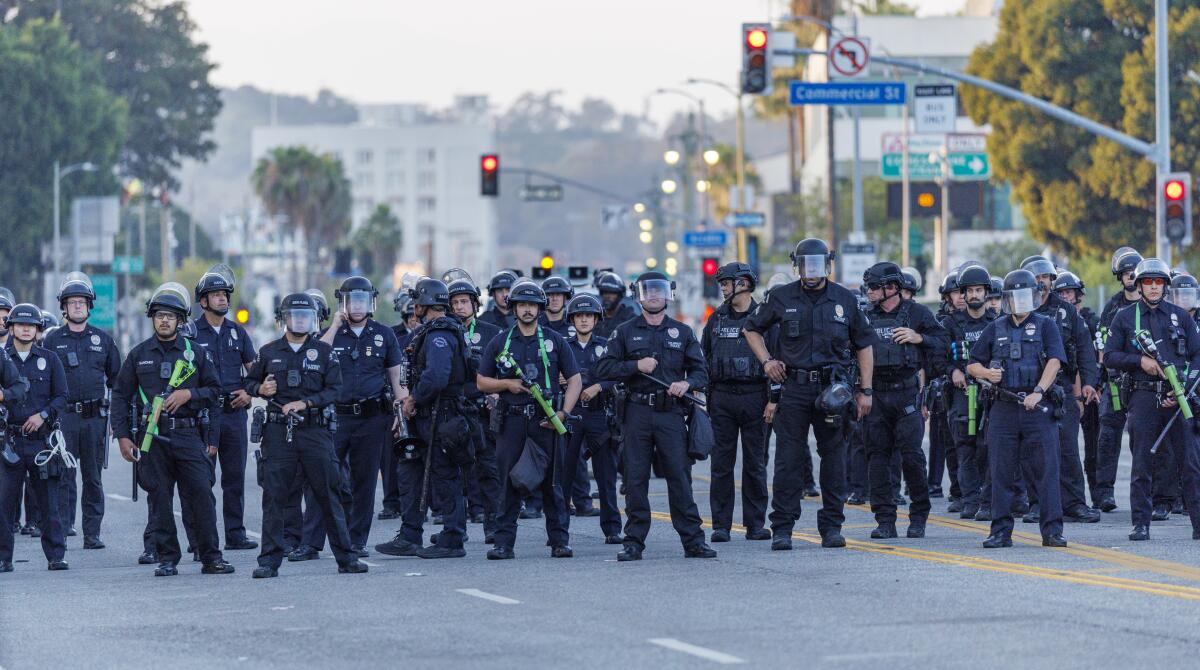 LAPD officers stand ready