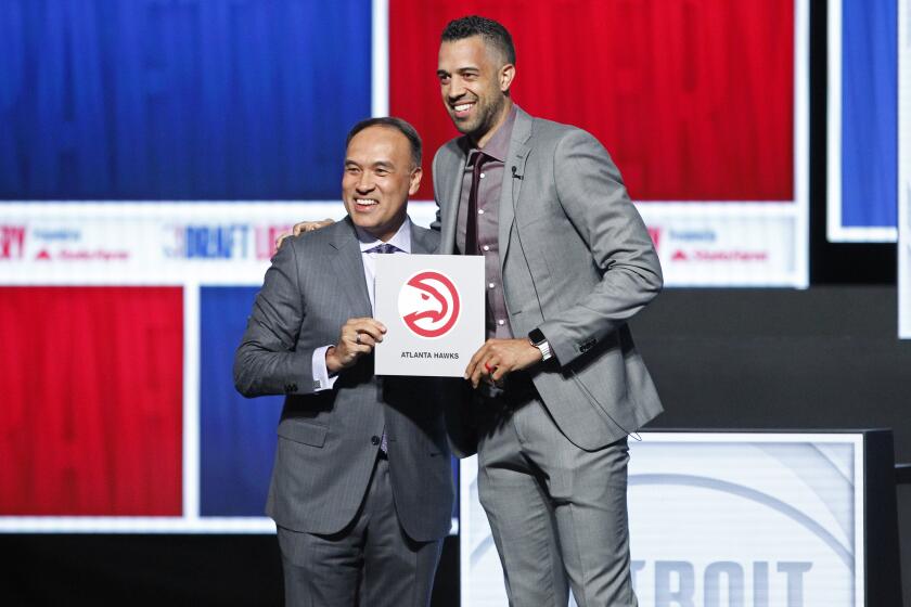 CHICAGO, IL - MAY 12: Landry Fields of the Atlanta Hawks and Mark Tatum pose for a photo during the 2024 NBA Draft Lottery on May 12, 2024 at the McCormick Convention Center in Chicago, IL. NOTE TO USER: User expressly acknowledges and agrees that, by downloading and or using this photograph, User is consenting to the terms and conditions of the Getty Images License Agreement. Mandatory Copyright Notice: Copyright 2024 NBAE (Photo by Kena Krutsinger/NBAE via Getty Images)