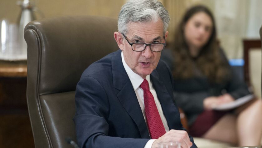 Federal Reserve Board Chairman Jerome Powell leads a meeting in June.