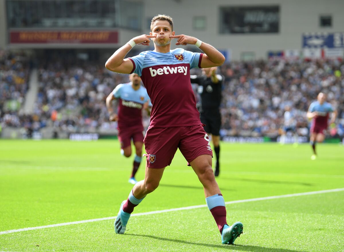 BRIGHTON, ENGLAND - AUGUST 17: Javier Hernandez of West Ham United celebrates after scoring his team's first goal during the Premier League match between Brighton & Hove Albion and West Ham United at American Express Community Stadium on August 17, 2019 in Brighton, United Kingdom. (Photo by Mike Hewitt/Getty Images) ** OUTS - ELSENT, FPG, CM - OUTS * NM, PH, VA if sourced by CT, LA or MoD **