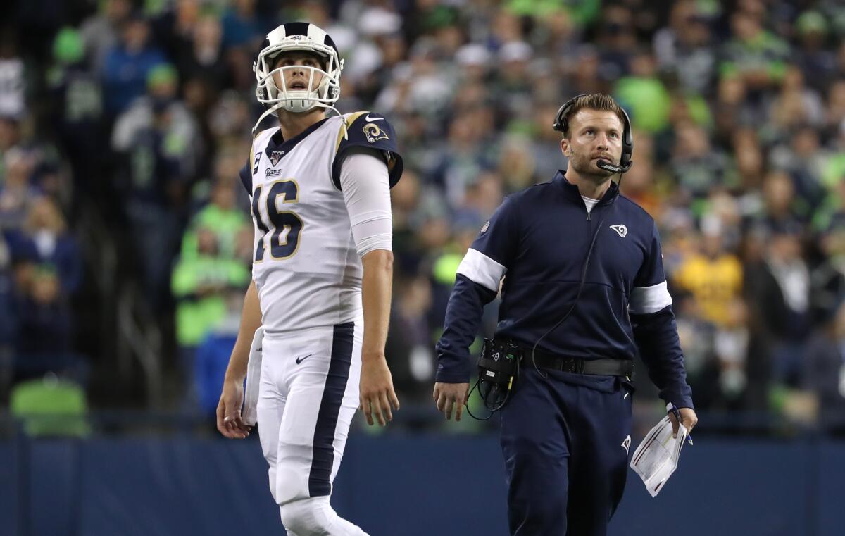 Rams quarterback Jared Goff and coach Sean McVay react after an incomplete pass on third down during a game against the Seahawks on Oct. 3 at CenturyLink Field.