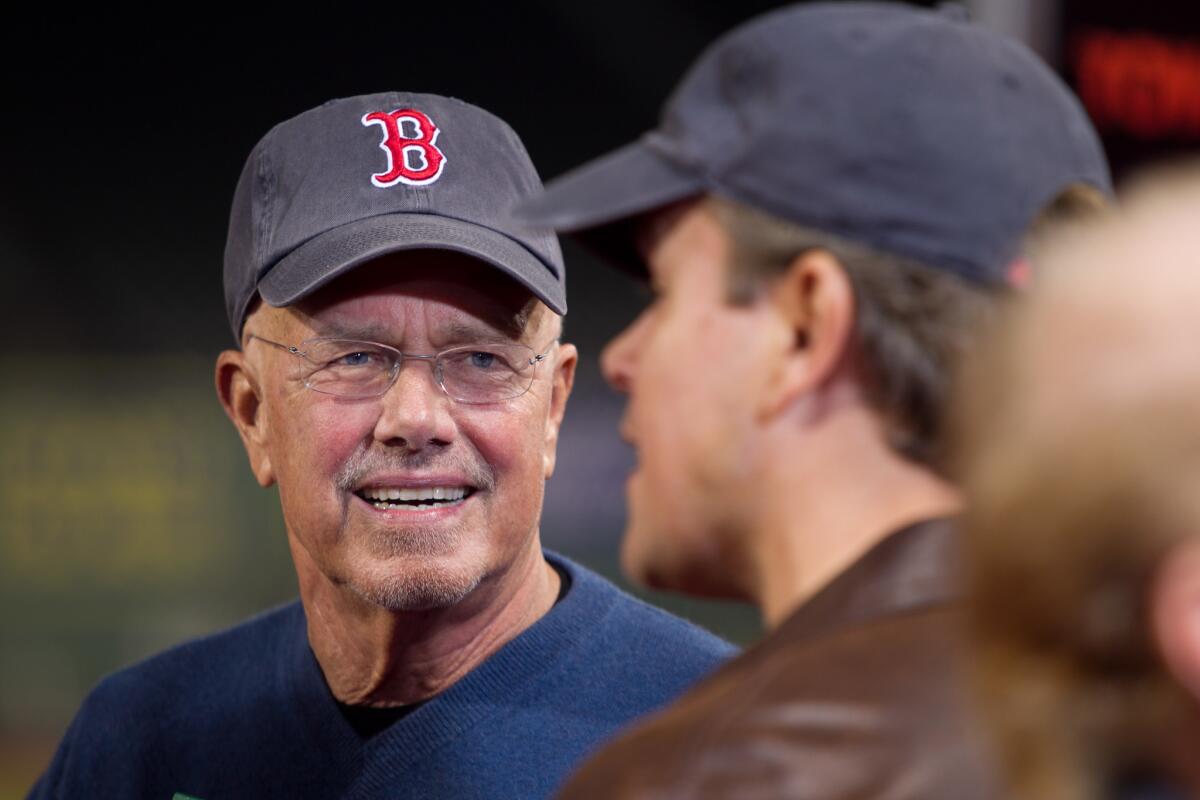 Kent Damon, left, and his son Matt attend the premiere of "The Town" at Fenway Park in Boston on Sept 14, 2010.