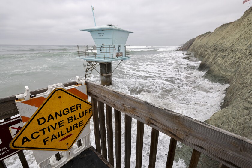 A lifeguard tower is surrounded by water at San Elijo State Beach in Encinitas on March 16.