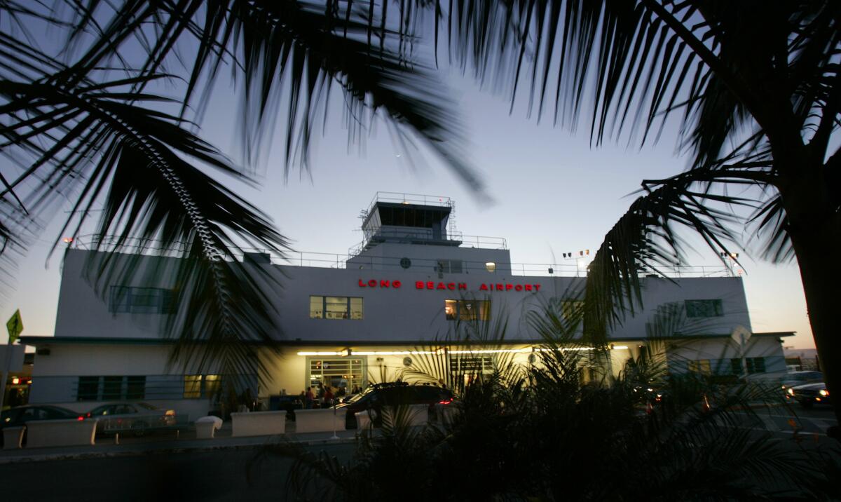 Passengers arrive at Long Beach Airport, where JetBlue, the facility's main carrier, had sought to add flights to Latin America.