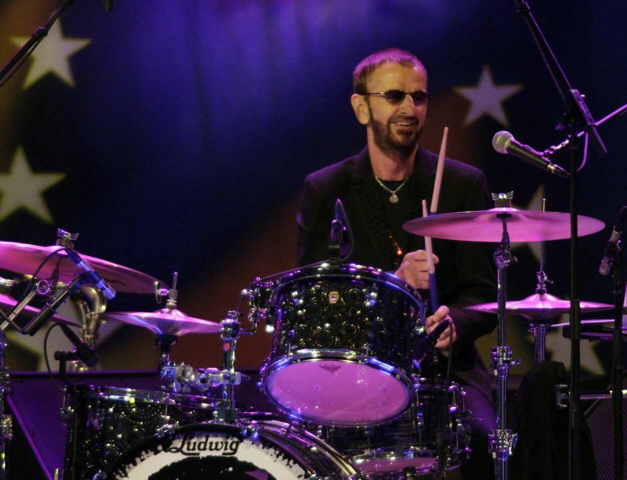 Ringo Starr is behind the drum kit at Los Angeles' Greek Theatre.