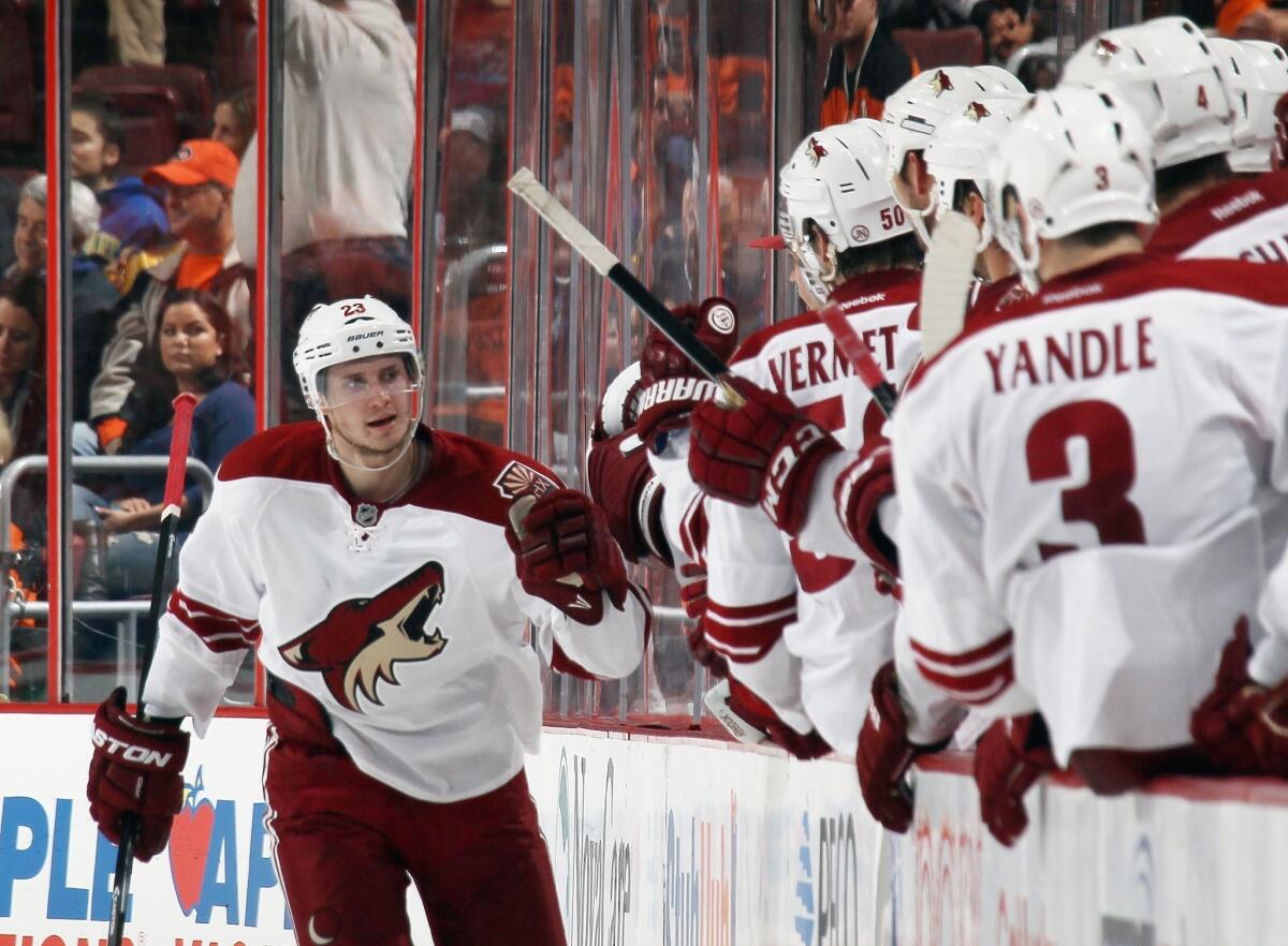Phoenix Coyotes defenseman Oliver Ekman-Larsson celebrates with his teammates after scoring a goal against the Philadelphia Flyers last month. The Coyotes are getting plenty of offense from their blueline corps.