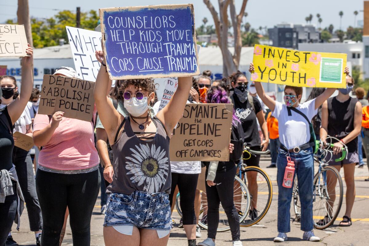 Protesters urge districts to cut school police funds Thursday