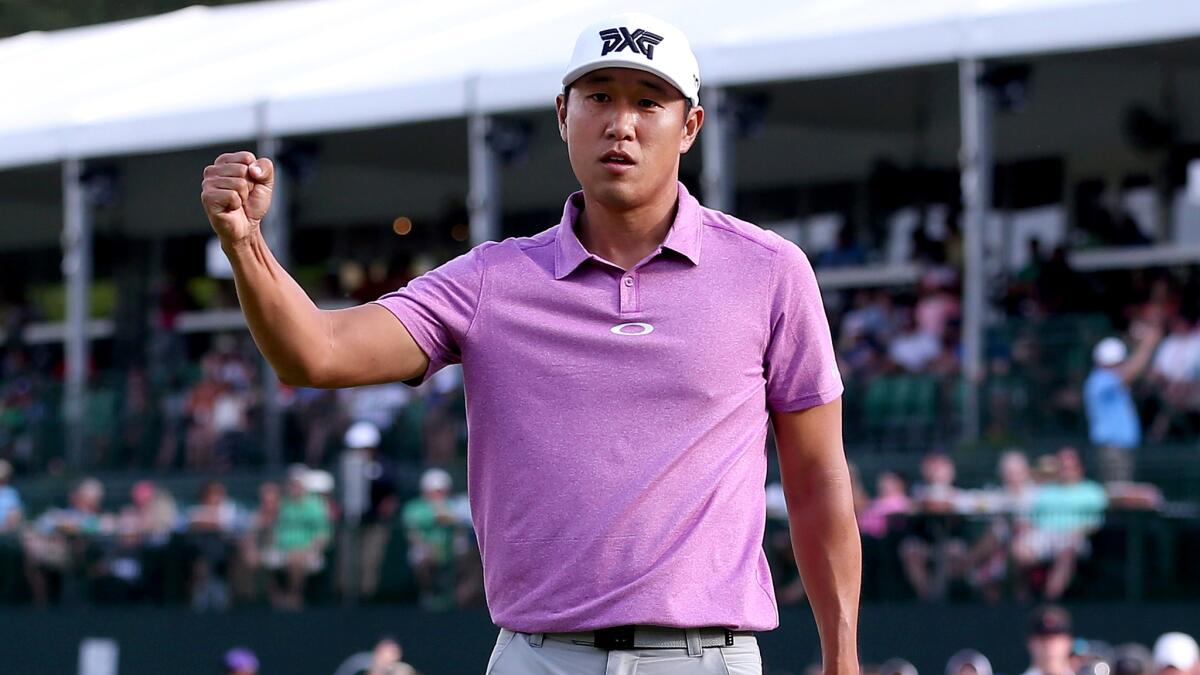 James Hahn celebrates after defeating Roberto Castro in a playoff during the final round of the Wells Fargo Championship on Sunday.