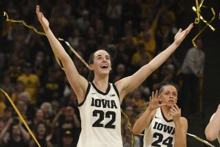 Iowa guard Caitlin Clark (22) celebrates during Senior Day ceremonies following a victory.