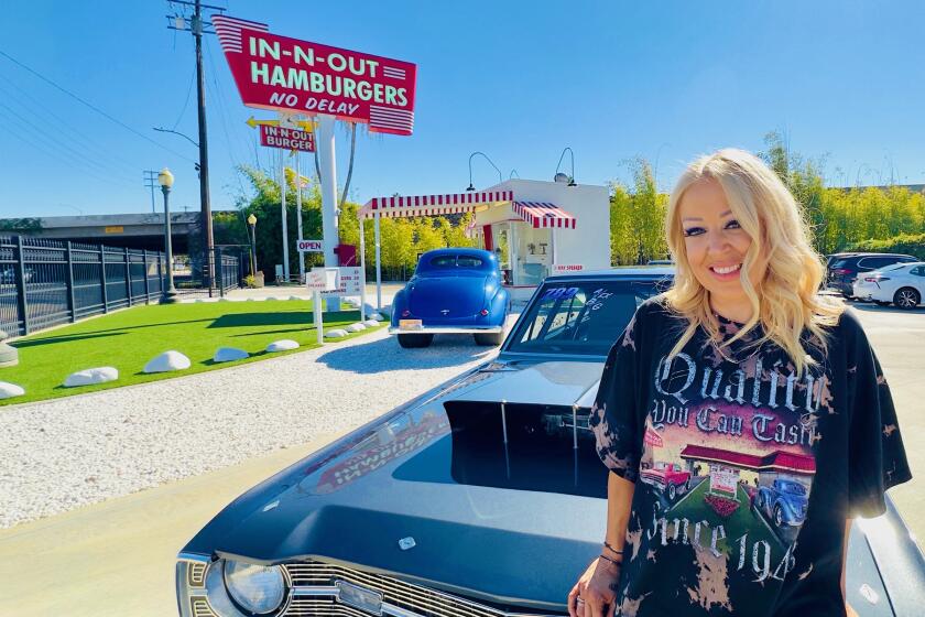 In-N-Out owner and CEO Lynsi Snyder visits a replica of the first In-N-Out hamburger stand in Baldwin Park.