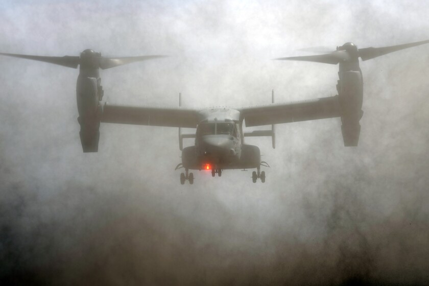 An MV-22 Osprey participates during a joint military helicopter borne operation drill between Japan Ground Self-Defense Force (JGSDF) and U.S. Marines at Higashi Fuji range in Gotemba, southwest of Tokyo, Tuesday, March 15, 2022. (AP Photo/Eugene Hoshiko)