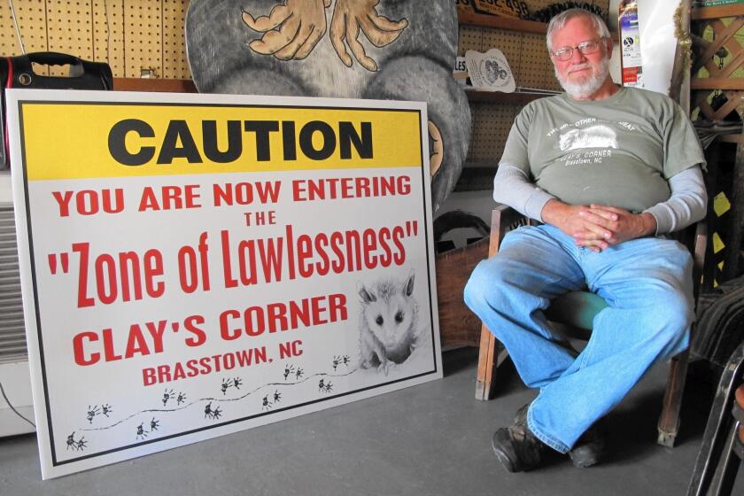 Clay Logan, owner of Clay's Corner country store in Brasstown, N.C., holds an annual Possum Drop on New Year's Eve. He says the opossum is always released afterward, unharmed, but People for the Ethical Treatment of Animals still objects.