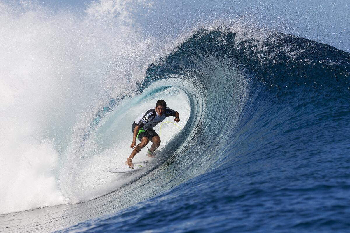 Miguel Pupo of Brazil competes in August at the Billabong Pro competition in Tahiti. Billabong wrote down the value of its namesake brand to zero.