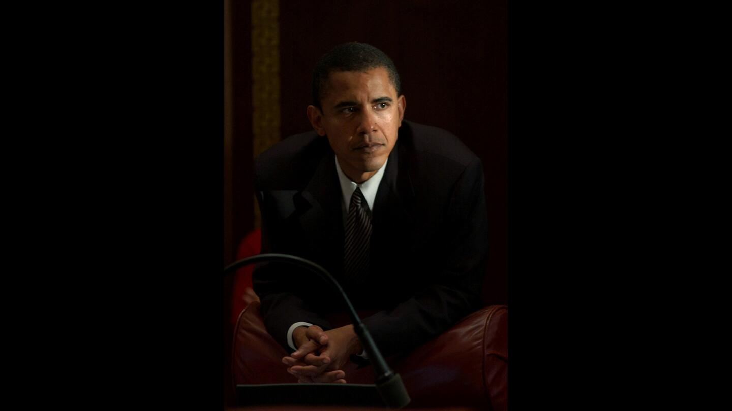 State Sen. Barack Obama from Chicago listens during a session May 31, 2002, in Springfield.